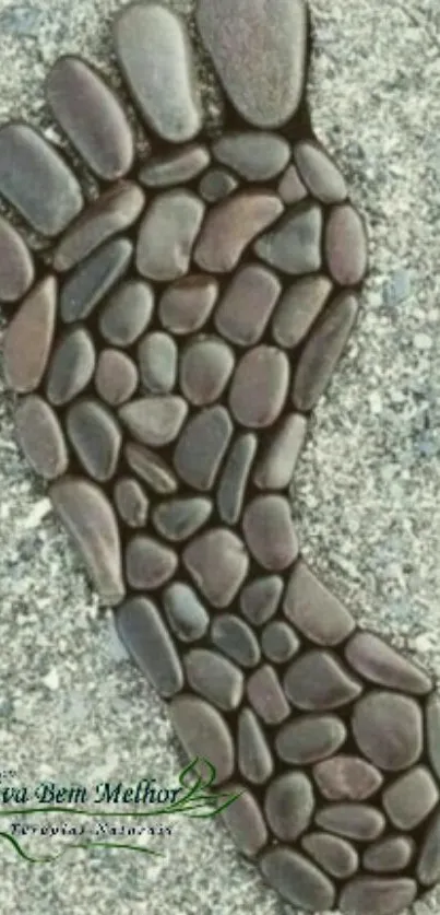 Artistic stone footprint on a textured gray background.