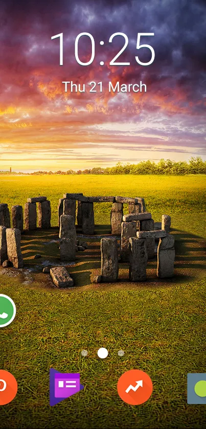 Stonehenge mobile wallpaper with sunset sky and app icons.