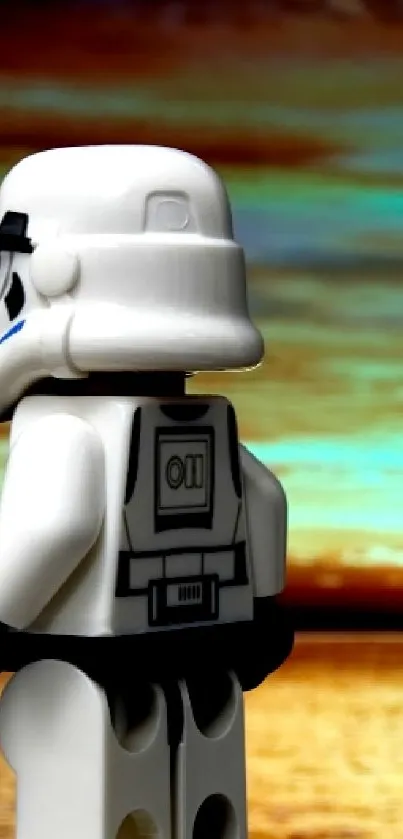 Two LEGO stormtroopers facing sunset on beach.