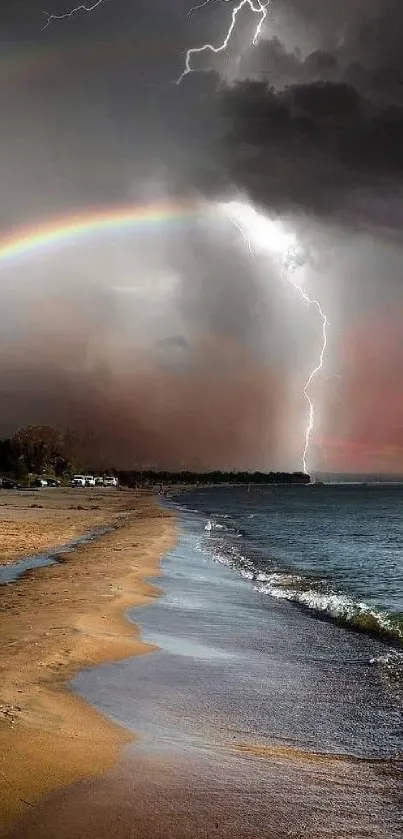 Mobile wallpaper of a stormy beach with a rainbow and lightning.