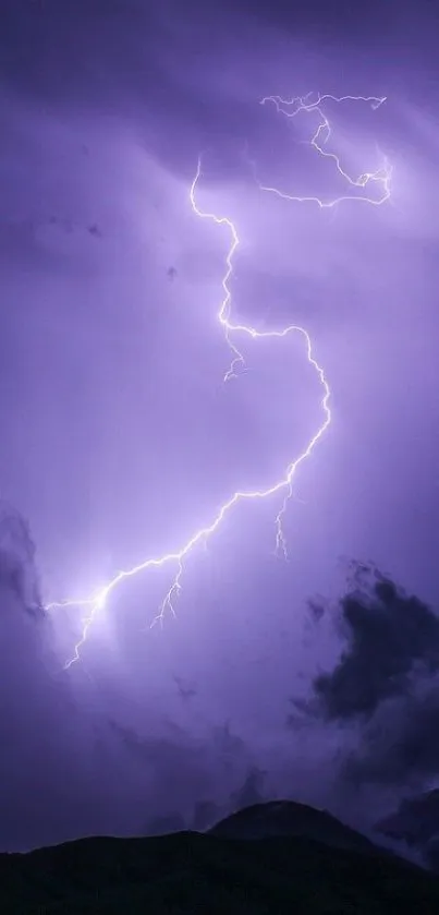 A vivid lightning strike against a purple stormy sky.