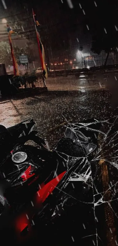 Motorcycle parked in a rainy street at night with red highlights.