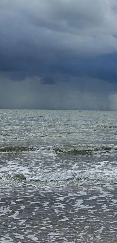 Stormy ocean with waves and dark clouds mobile wallpaper.