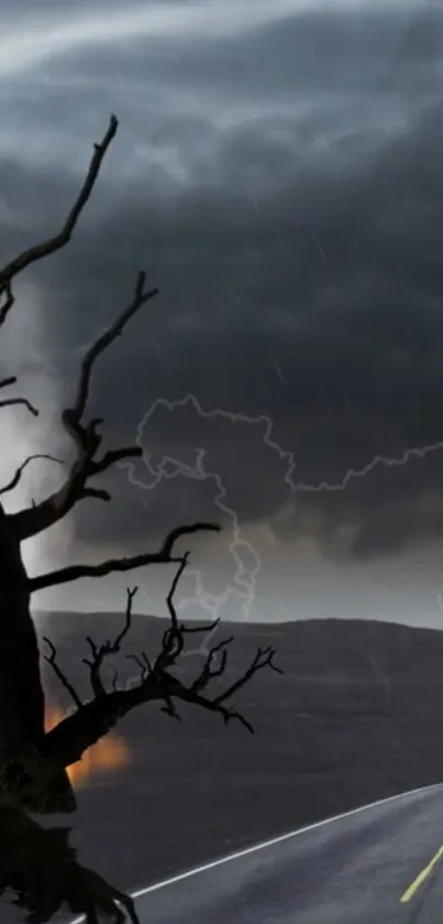 Stormy sky over a deserted road with dark clouds and barren trees.