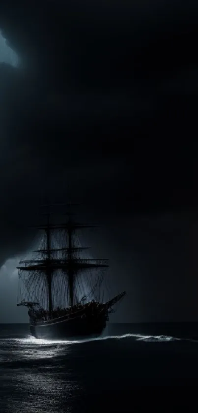 Dark ship sails under stormy night sky on the ocean.