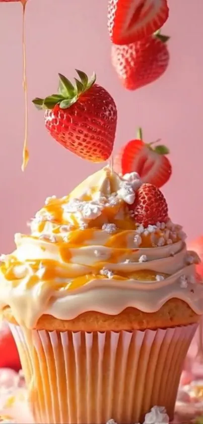 Cupcake with strawberries and pink background