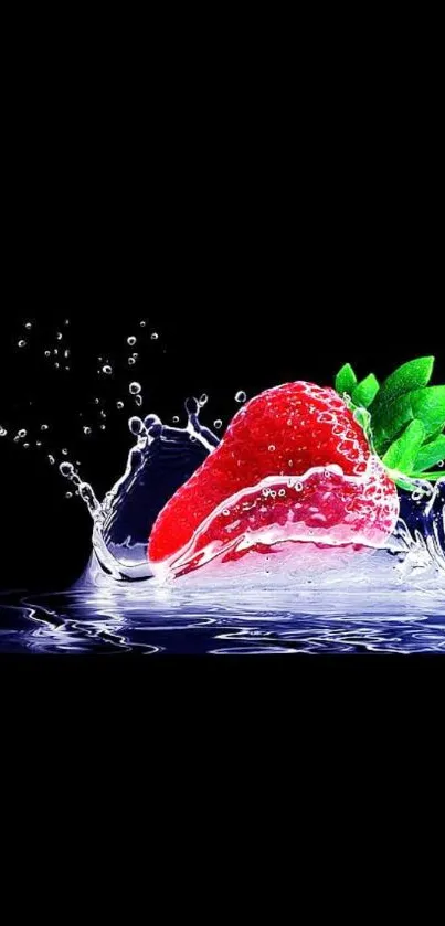 A strawberry splashing into water on a black background.