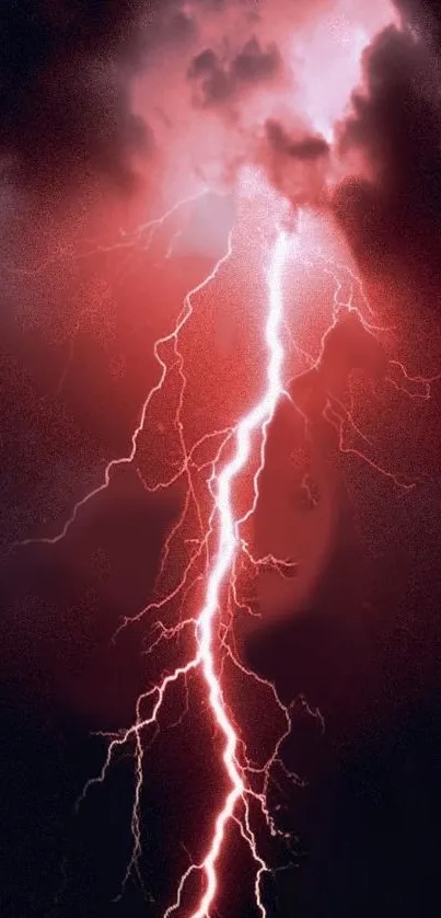 A vibrant red lightning strike against a dark stormy sky.