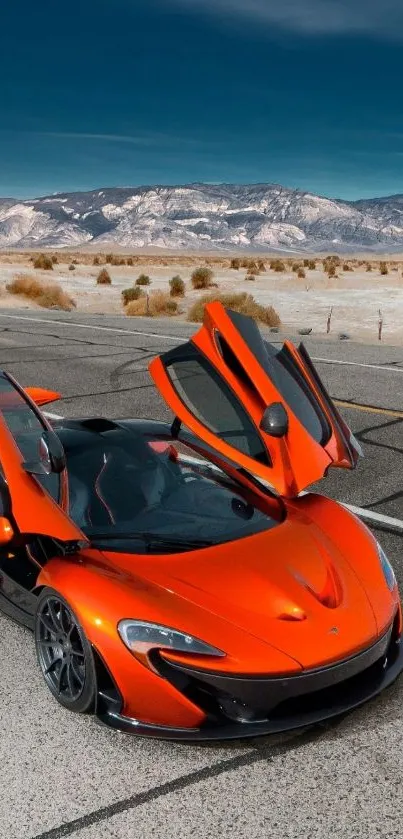 Orange sports car with open doors in desert landscape.