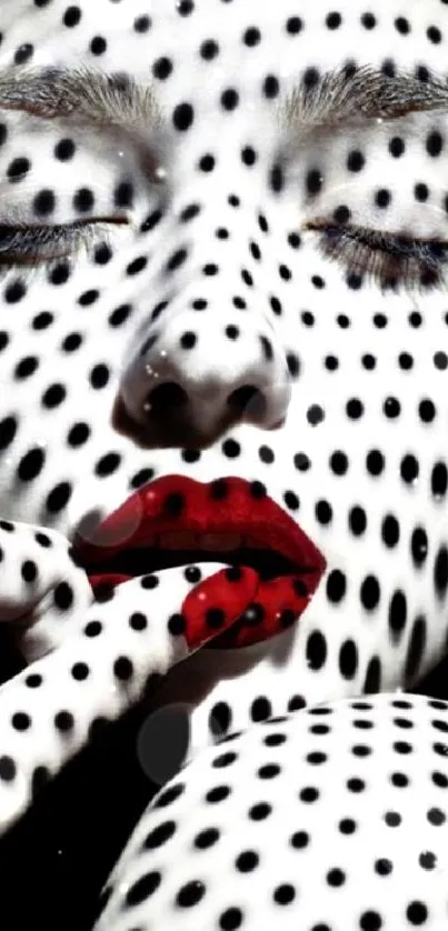 Artistic wallpaper with red lips and polka dot pattern on a face.