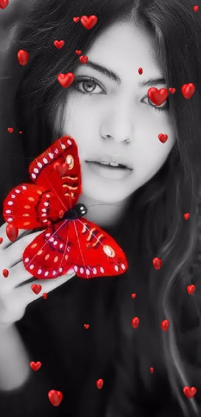 Black-and-white portrait with a vivid red butterfly.