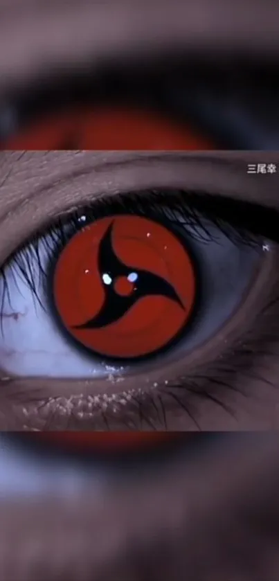 Close-up of a striking red eye with a dynamic anime-inspired design.