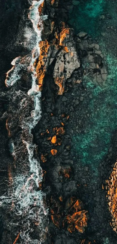 Aerial view of rocky coastline and turquoise ocean.