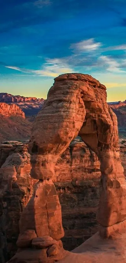 Delicate Arch against a vibrant sunset sky in Arches National Park.