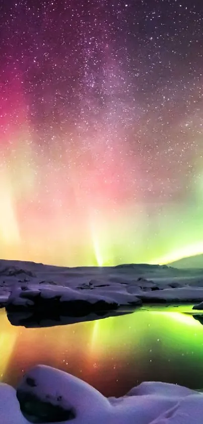 Vibrant aurora borealis over snowy landscape reflected in icy waters.