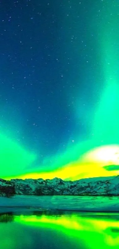 Aurora Borealis lights over snowy landscape reflecting in a lake.