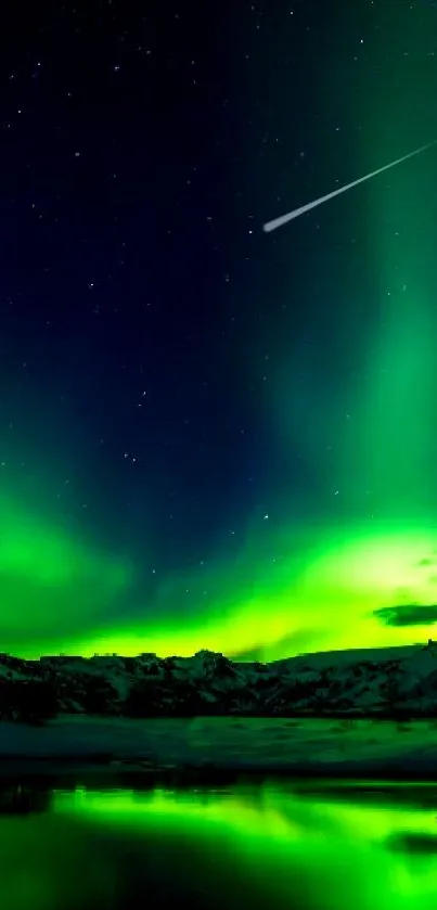 Green aurora borealis over snowy mountains and reflective lake.