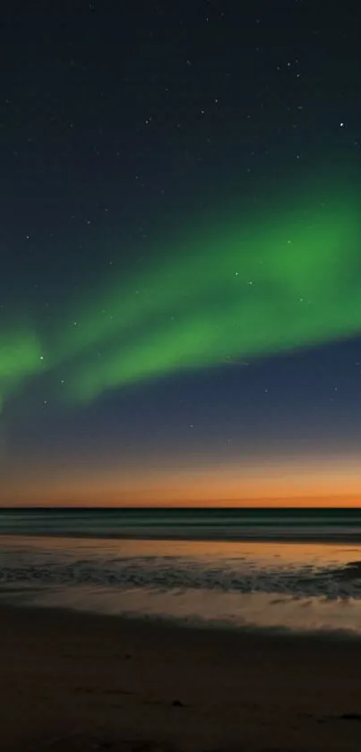 Vibrant Aurora Borealis over serene sea under a starry sky at night.