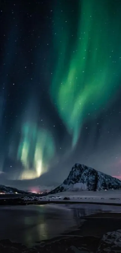 Northern Lights over snowy mountain with green auroras.