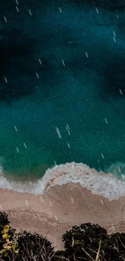 Aerial view of a serene beach with turquoise waters and sandy shore.