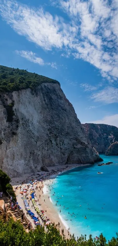 Beach wallpaper with cliffs and azure sea under a sunny sky.