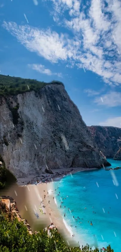 Majestic cliffs and turquoise beach with sky view.