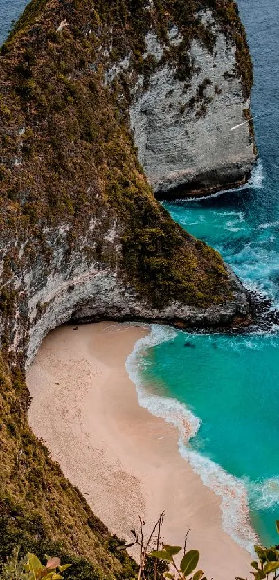 A stunning beach cove with turquoise water and dramatic cliffs.