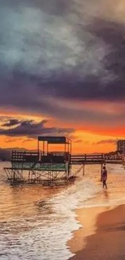 A serene sunset on a beach with vibrant sky and waves.