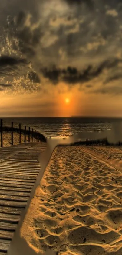 Beach sunset wallpaper with golden sky and sand dunes.