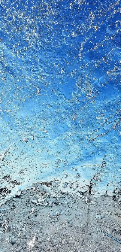 Ice texture and blue sky wallpaper for mobile devices.