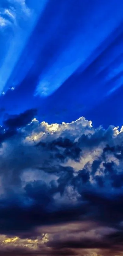 Dramatic blue sky with radiant clouds and sunrays for mobile wallpaper.