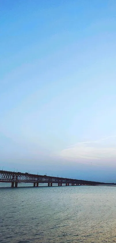 Scenic view of bridge over river with sunrise sky.