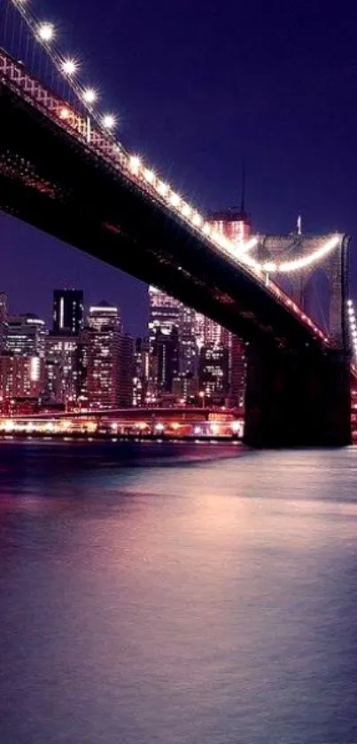 Illuminated bridge over city skyline at night.