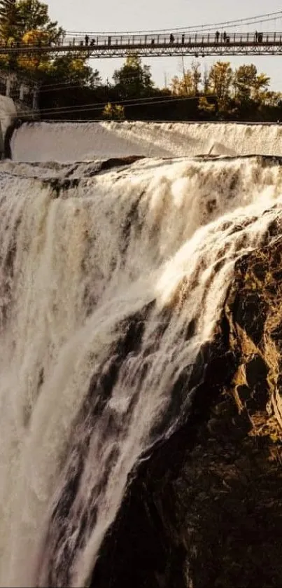 Breathtaking waterfall with autumn trees in a serene Canadian landscape.