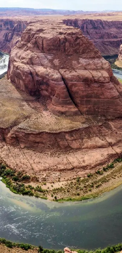 Breathtaking view of a winding river through a canyon with vivid colors.