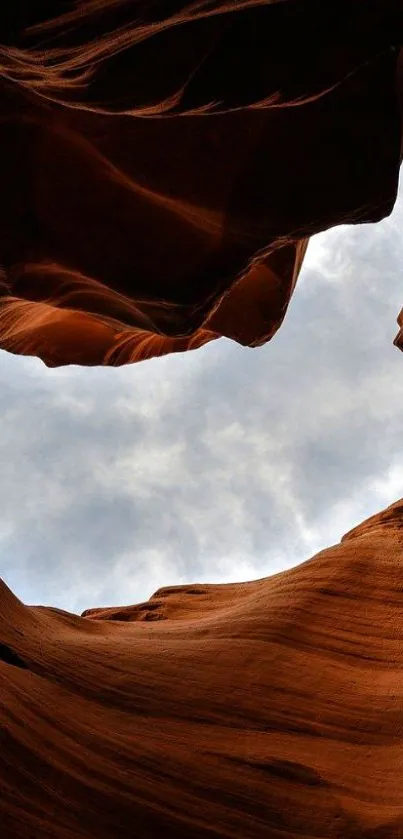 Breathtaking view of canyon against blue sky, showcasing stunning rock formations.