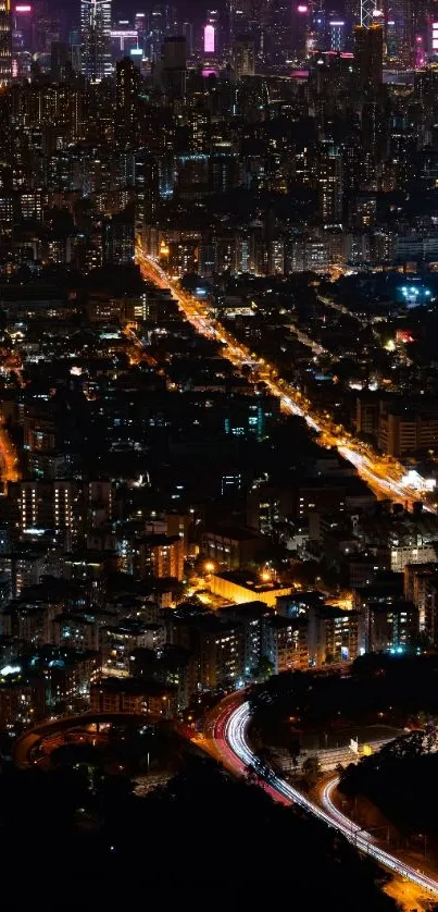 City skyline at night with vibrant lights.