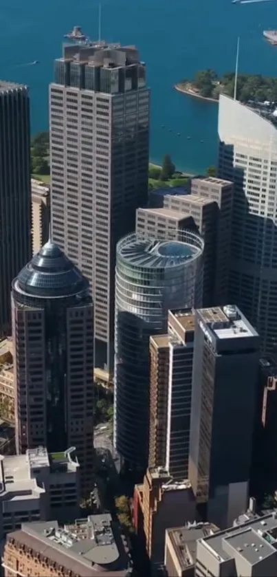 Aerial view of a city skyline with skyscrapers and a waterfront in the background.