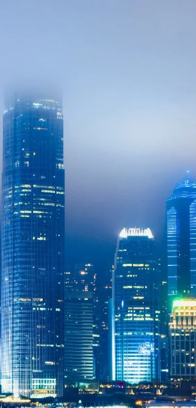 Vibrant night city skyline with illuminated skyscrapers.