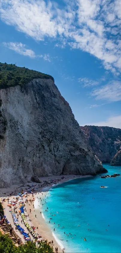 Stunning beach with turquoise ocean and dramatic cliffs.