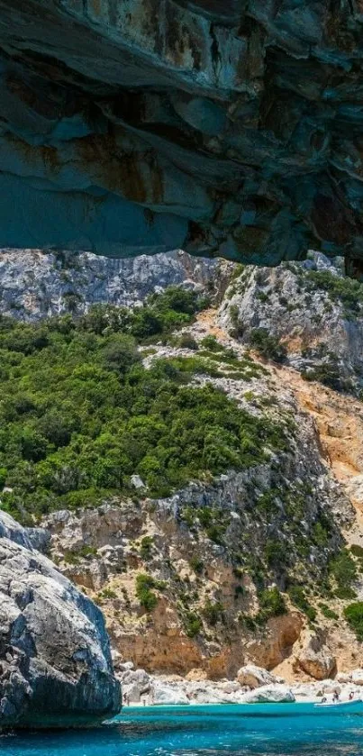 Beautiful view of a coastal cave with turquoise waters and rugged cliffs.