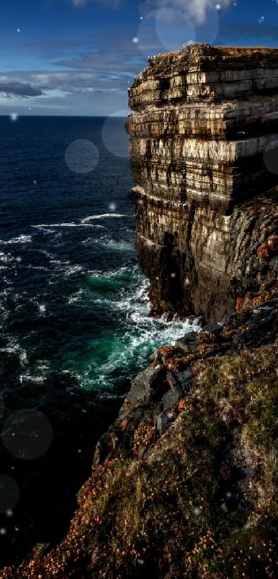 Majestic cliff and ocean view with dynamic sky.