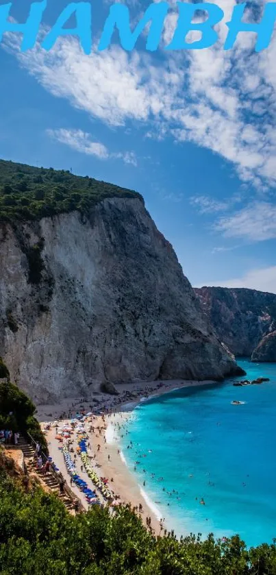 A stunning cliffside beach with blue skies and turquoise ocean waters.