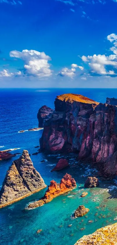 Majestic coastal cliffs with blue ocean and sky.