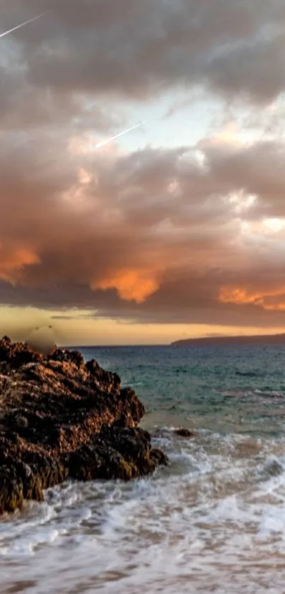 Beautiful coastal sunset with ocean waves and colorful sky.