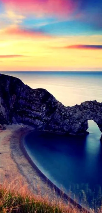 Coastal sunset with vibrant skies and tranquil blue sea.