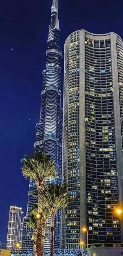 Dubai skyline at night with illuminated skyscrapers and Burj Khalifa.