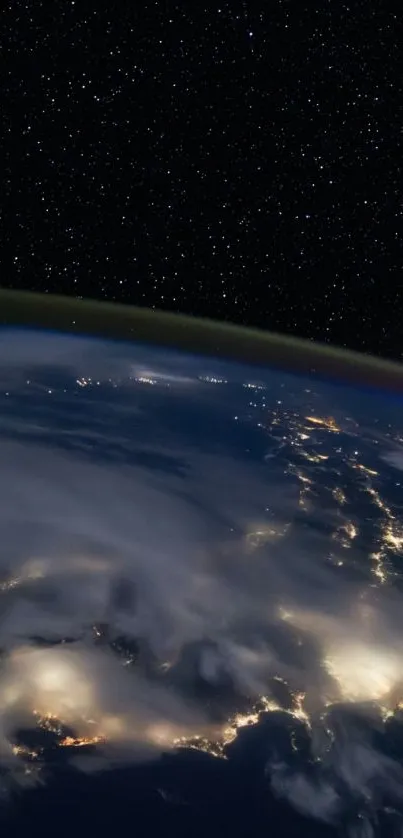 A stunning night view of Earth from space, highlighting glowing city lights.