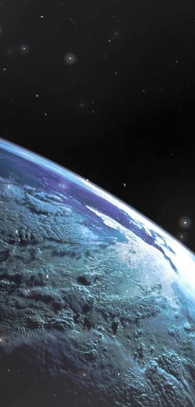 View of Earth from space with a deep blue tone and dark background.