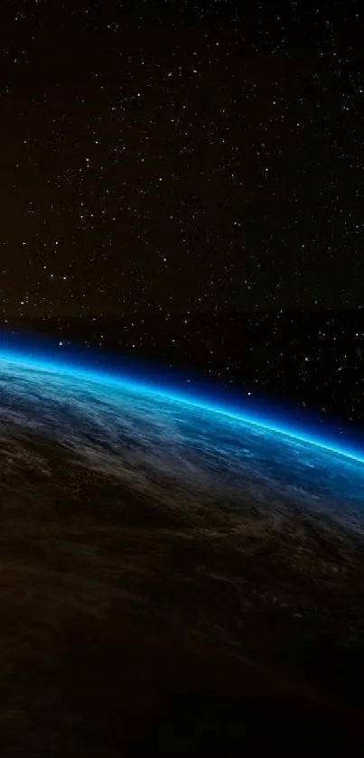 A stunning view of Earth from space with a glowing horizon under starry skies.